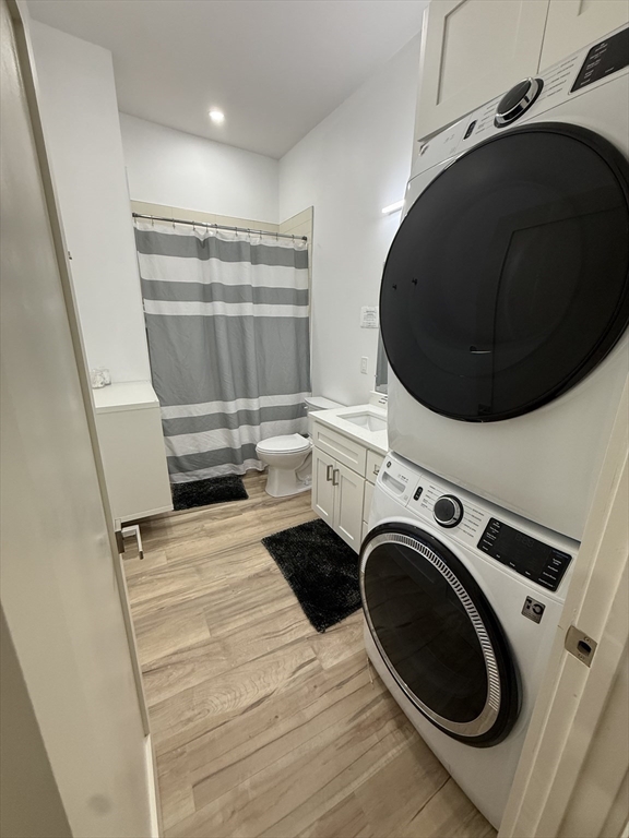 120 Regent Street, Unit 5 Boston, MA 02119 - Photo 22 of 27 a view of walk in closet with clothes and shoes