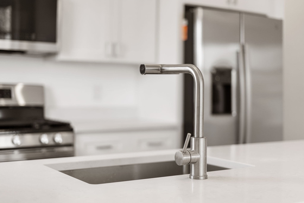 120 Regent Street, Unit 5 Boston, MA 02119 - Photo 7 of 27 a bathroom with a tub and a sink
