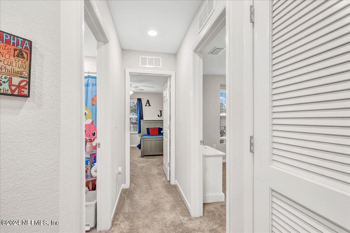 183 Silver Fern Drive St. Augustine, FL 32086 - Photo 22 of 29 a view of an entryway with a workspace