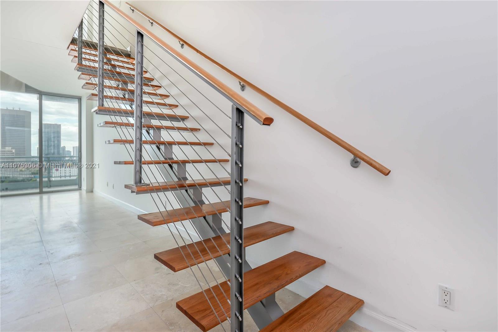 690 Southwest 1st Court, Unit 1715 Miami, FL 33130 - Photo 18 of 42 a view of entryway with wooden floor