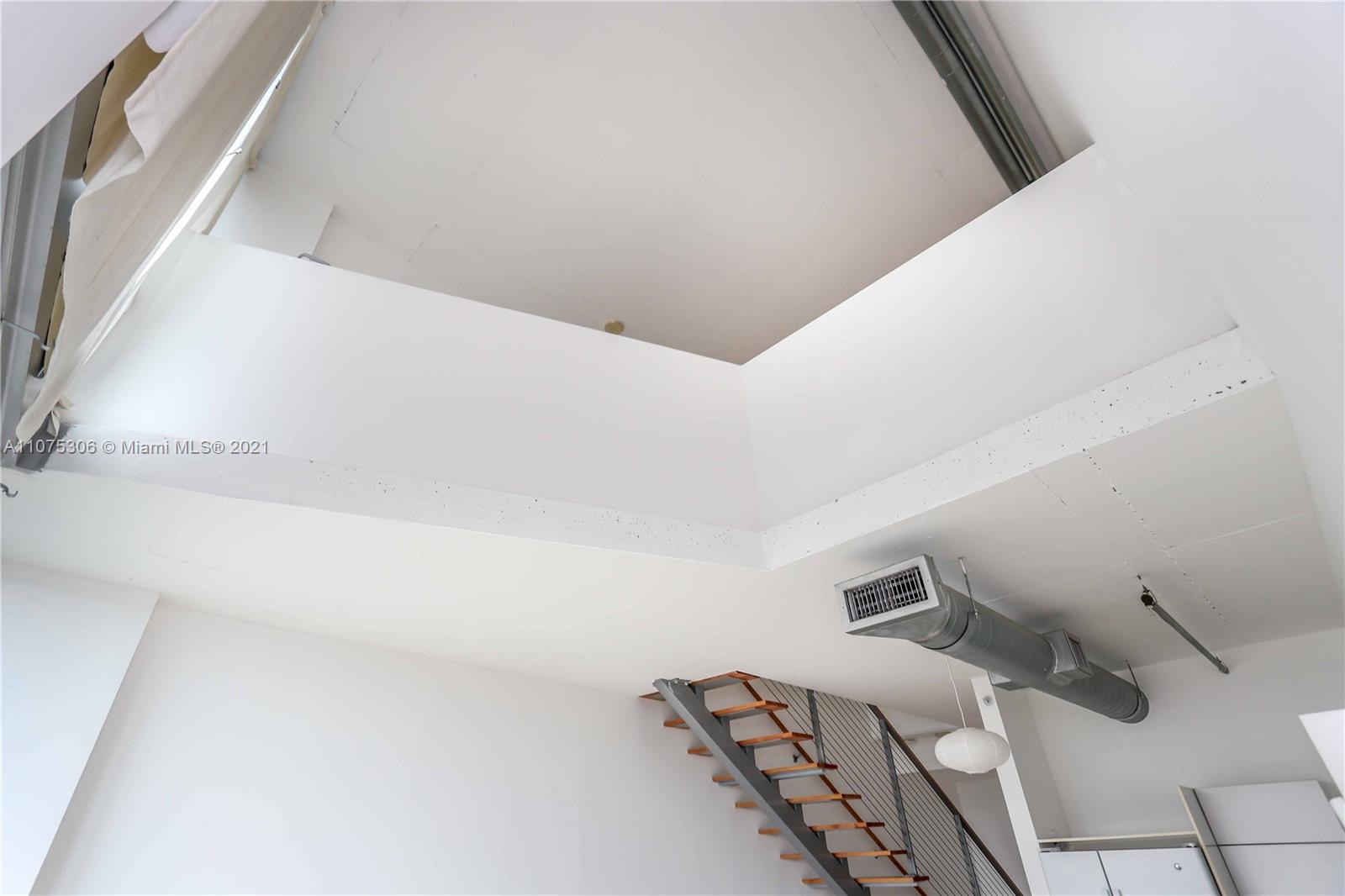 690 Southwest 1st Court, Unit 1715 Miami, FL 33130 - Photo 27 of 42 a view of a room with racks on the wall