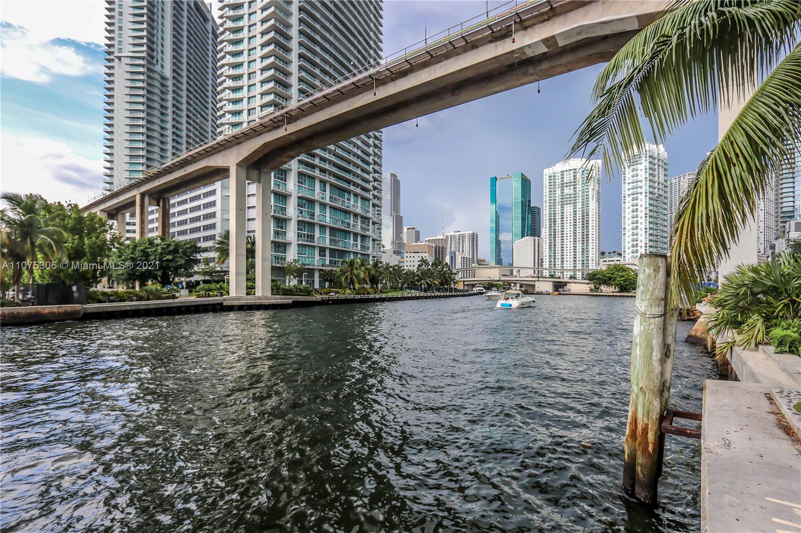 690 Southwest 1st Court, Unit 1715 Miami, FL 33130 - Photo 37 of 42 a view of swimming pool with outdoor seating and plants