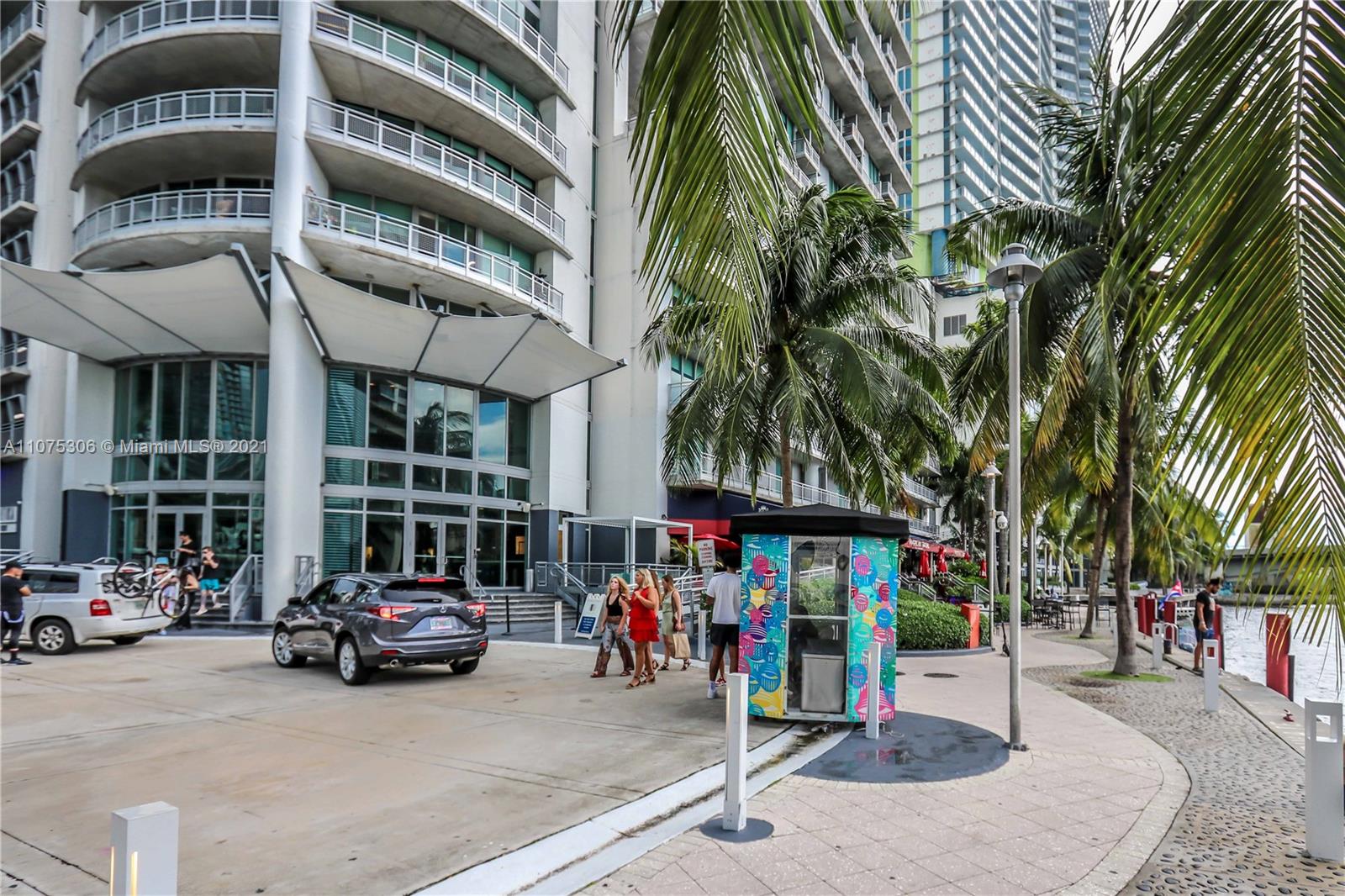 690 Southwest 1st Court, Unit 1715 Miami, FL 33130 - Photo 38 of 42 a car parked in front of building