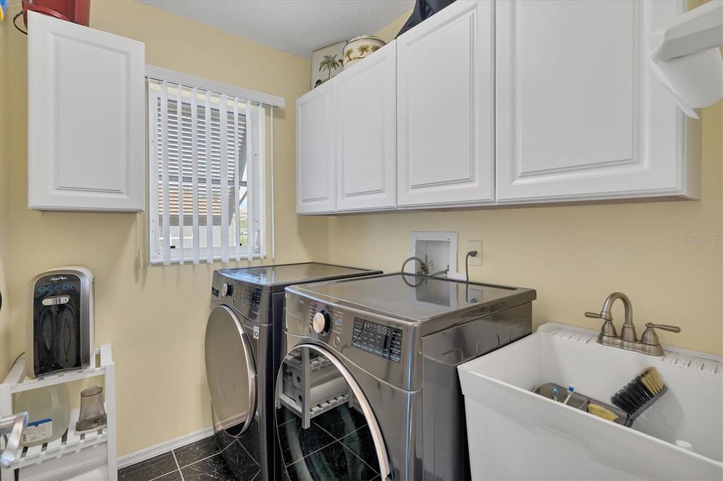 245 Spaniards Road Placida, FL 33946 - Photo 40 of 65 a utility room with dryer and washer