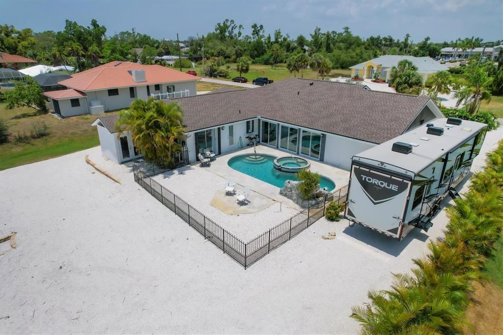 245 Spaniards Road Placida, FL 33946 - Photo 55 of 65 an aerial view of a house with a garden