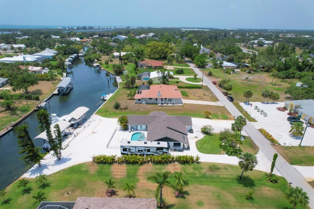 245 Spaniards Road Placida, FL 33946 - Photo 58 of 65 an aerial view of residential houses with outdoor space and river