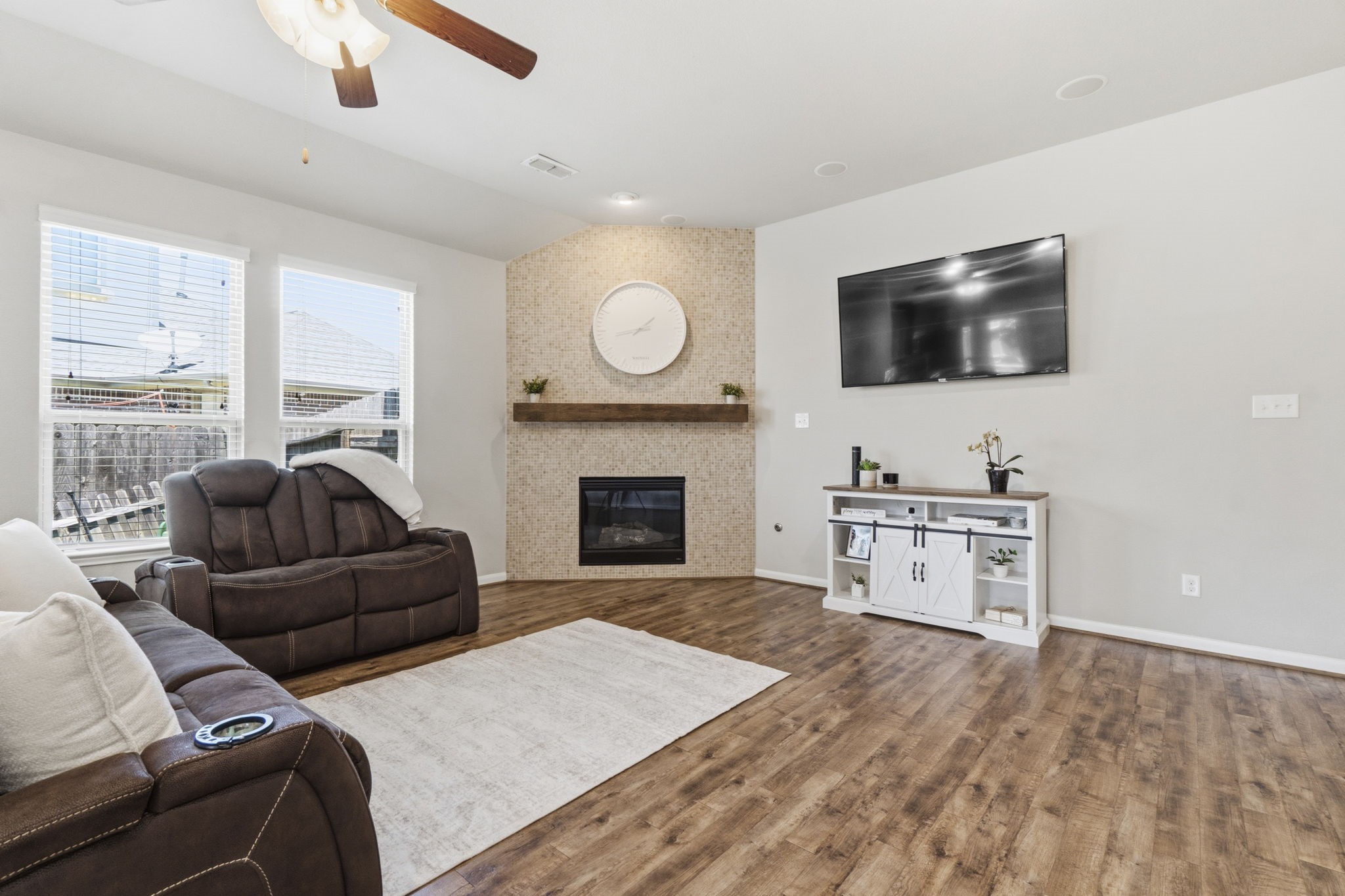 3900 Enchanted Timbers Lane Spring, TX 77386 - Photo 10 of 49 a living room with furniture and a fireplace