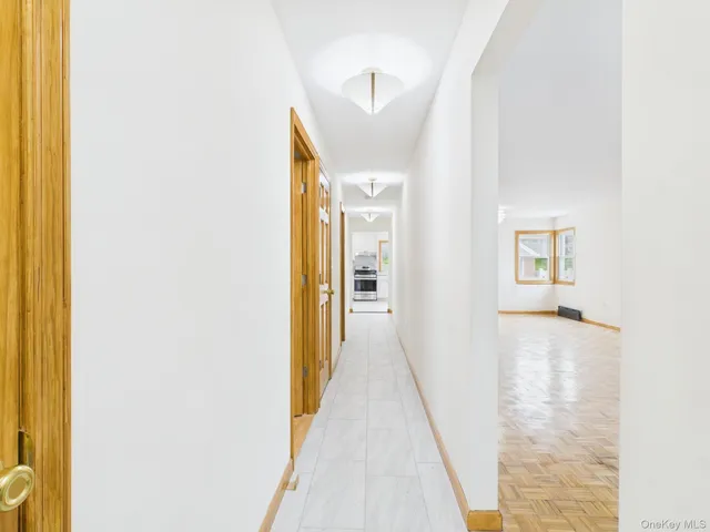 a view of a bathroom from a hallway