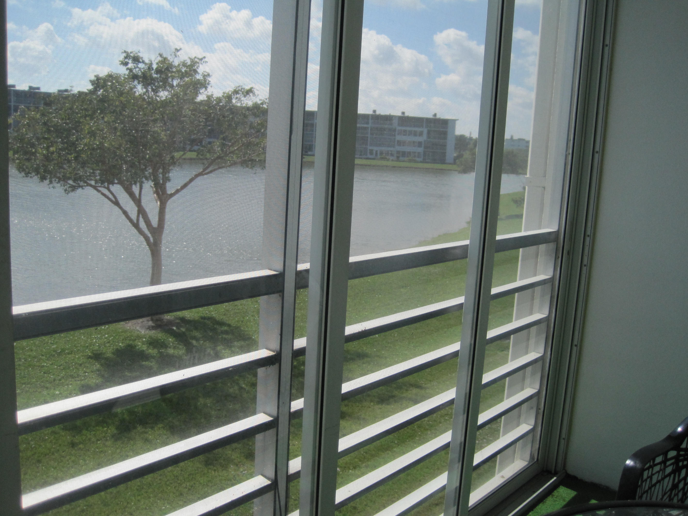 2030 Rexford B, Unit 2030 Boca Raton, FL 33434 - Photo 13 of 13 sliders on Porch- View