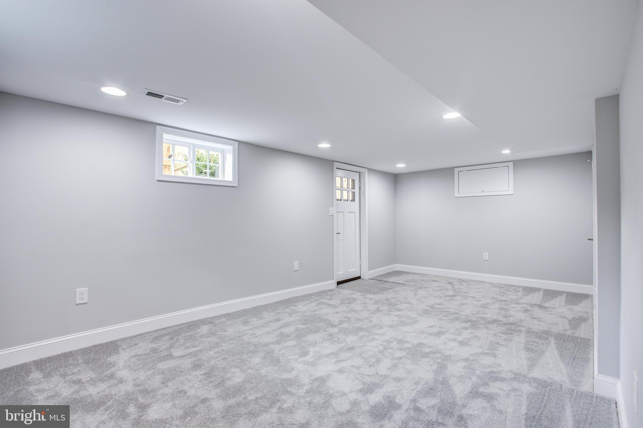 10004 Quinby Street Silver Spring, MD 20901 - Photo 35 of 40 Lower level recreation room
