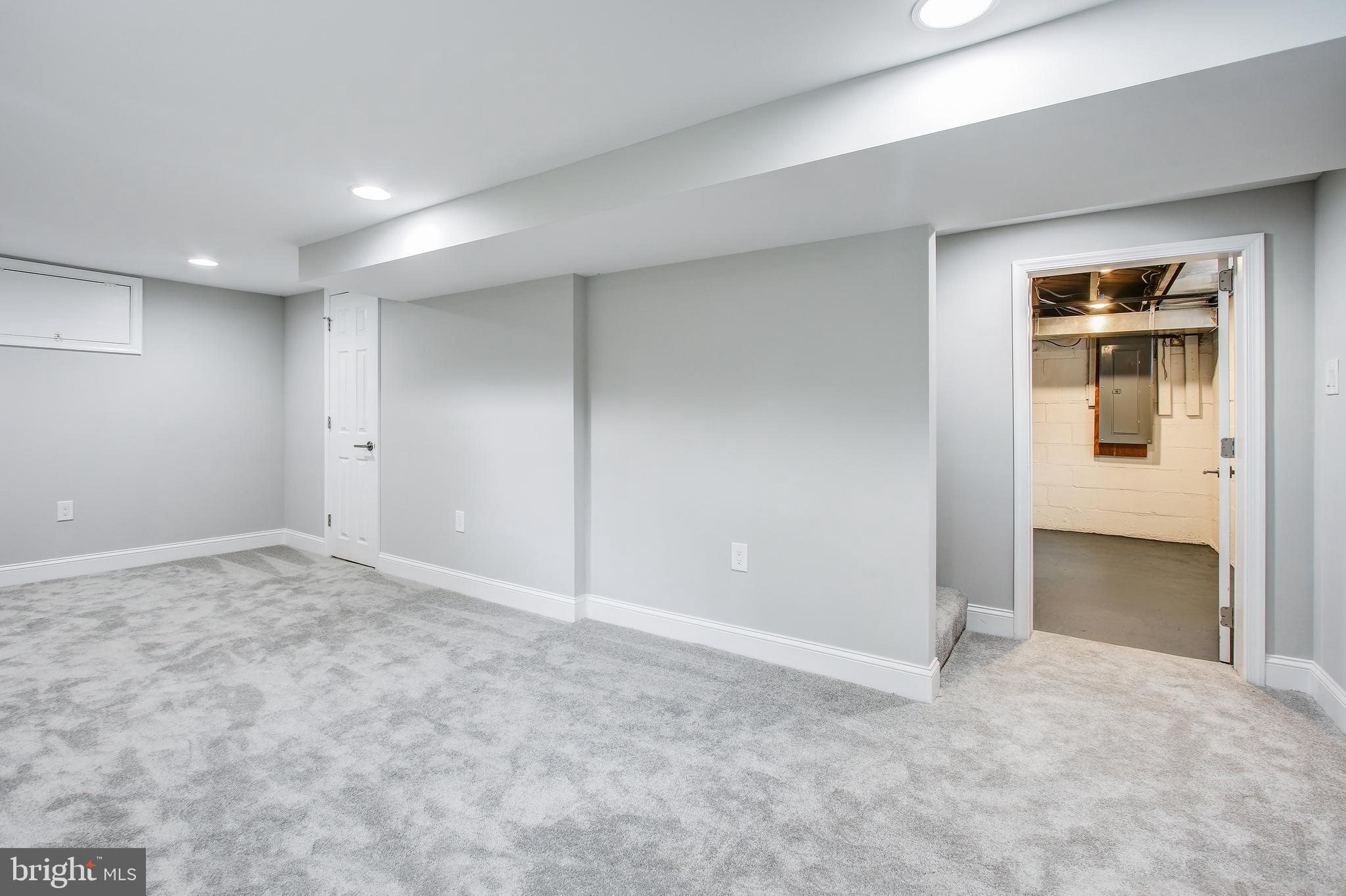 10004 Quinby Street Silver Spring, MD 20901 - Photo 36 of 40 Lower level recreation room