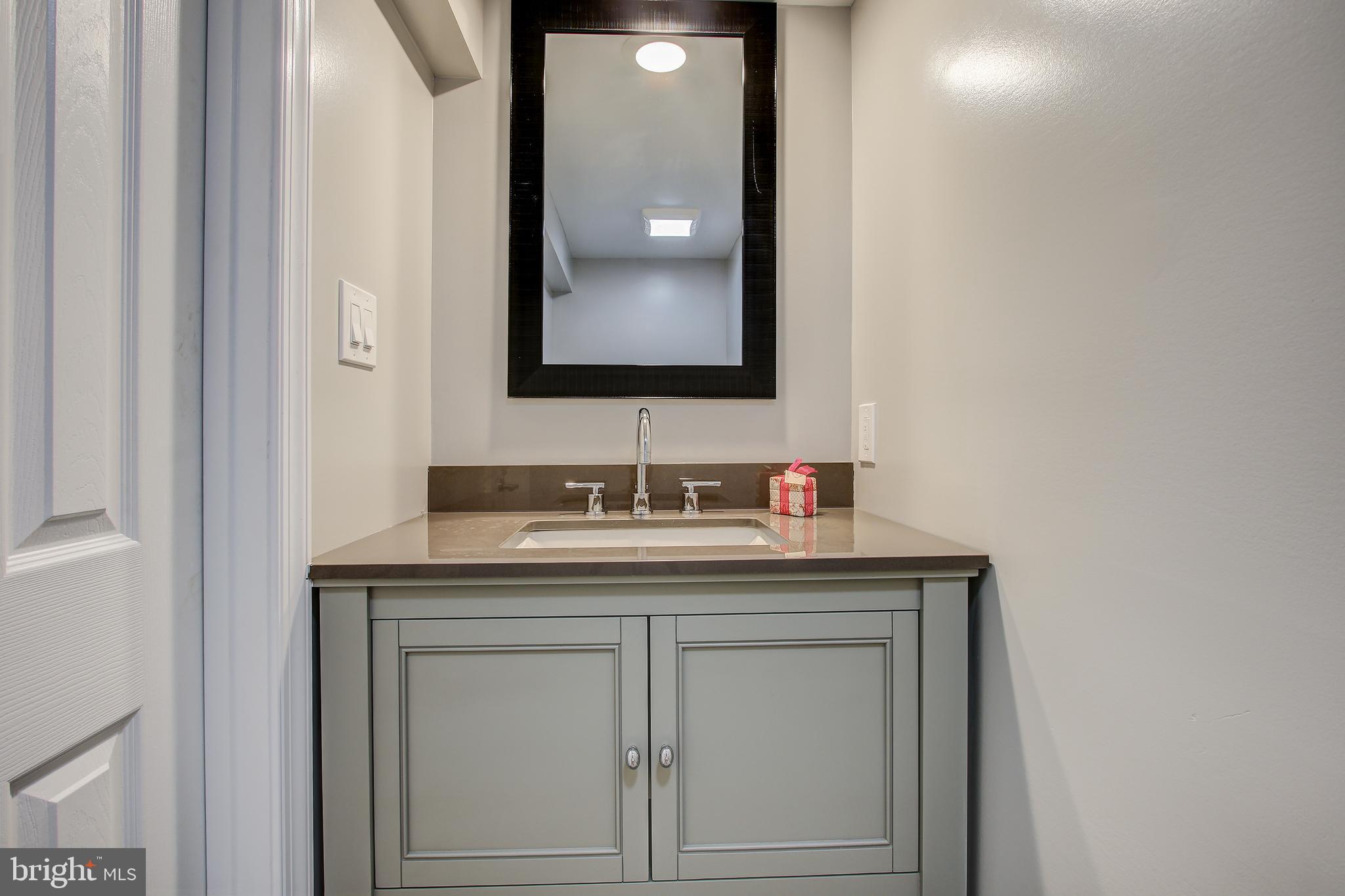 10004 Quinby Street Silver Spring, MD 20901 - Photo 37 of 40 Lower level half bath