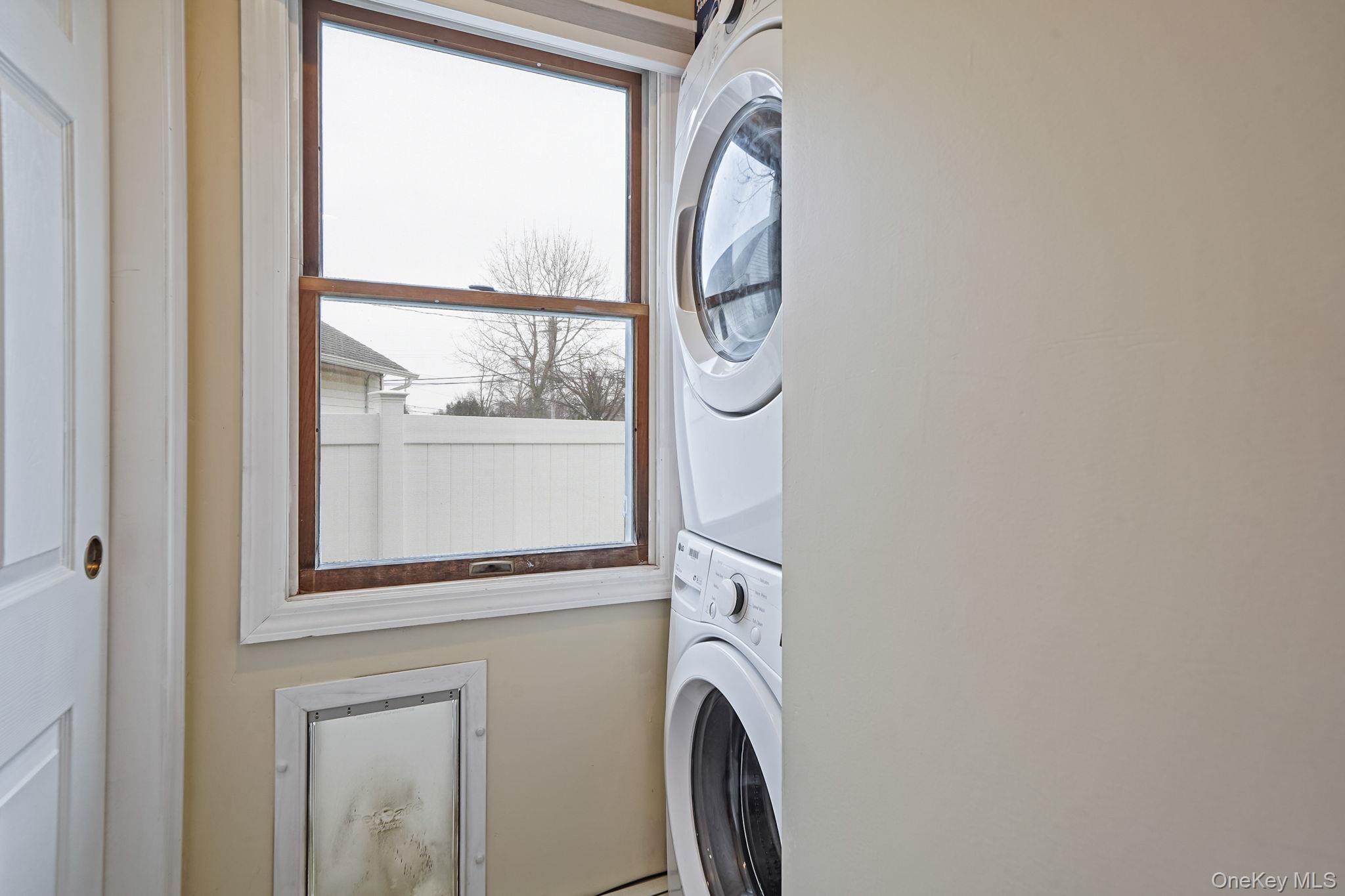 11 Nehring Avenue Babylon, NY 11702 - Photo 20 of 27 a utility room with dryer and washer