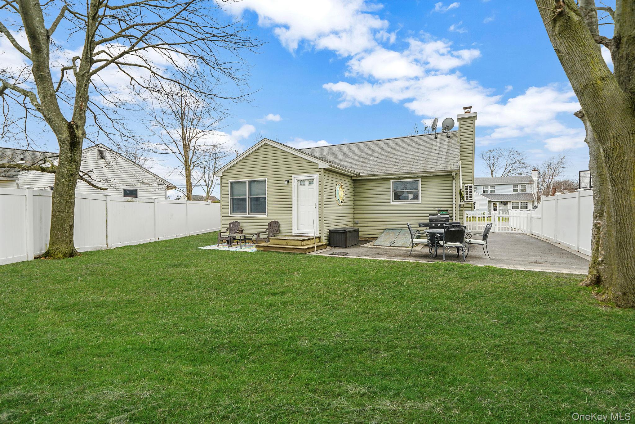11 Nehring Avenue Babylon, NY 11702 - Photo 22 of 27 a front view of a house with patio
