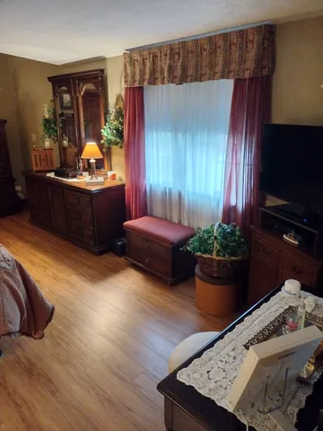 a bathroom with a sink a mirror and vanity