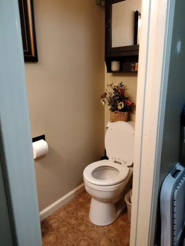 a bathroom with a shower and a bath tub