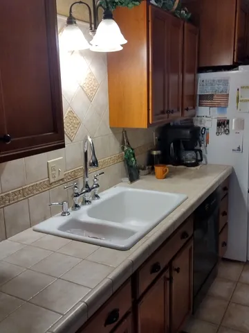 a hallway with a view of living room