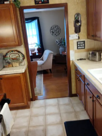 a kitchen with a sink and cabinets