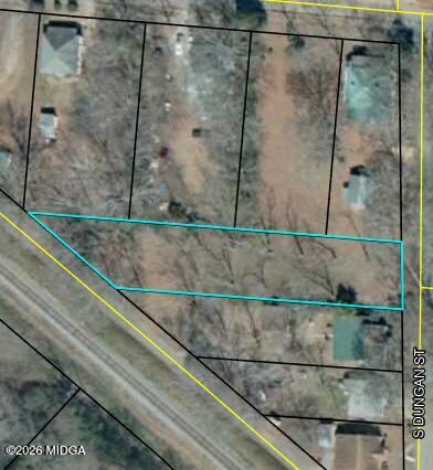 0 Dungan Street Forsyth, GA 31029 - Photo 1 of 1 a bathroom with a shower and a sink