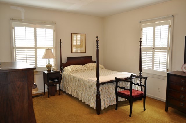 1709 Upper River Road Macon, GA 31211 - Photo 7 of 34 a bedroom with a bed and a window