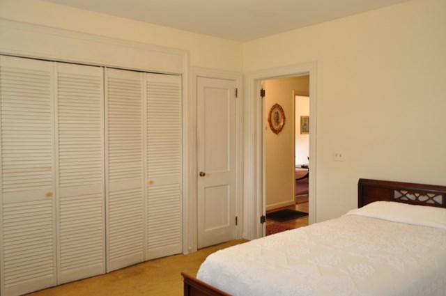 1709 Upper River Road Macon, GA 31211 - Photo 10 of 34 a bedroom with a bed and a shower