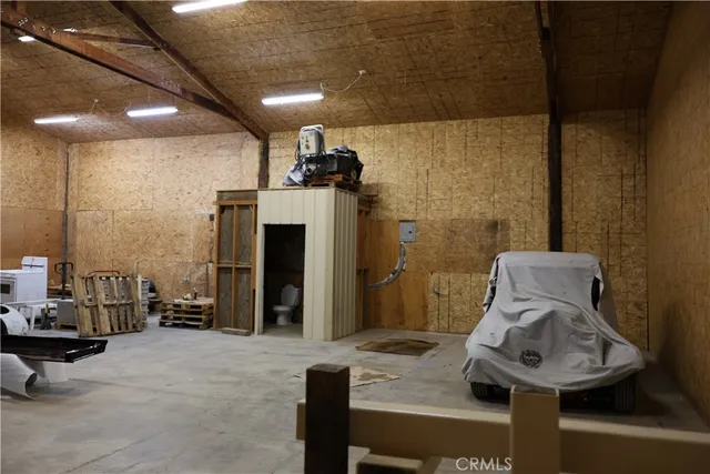 a view of a road with a field