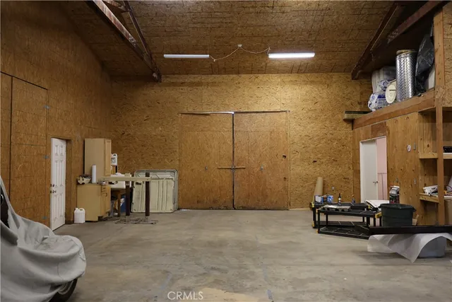 a view of a swimming pool with a yard