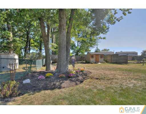 130 Jordan Road Colonia, NJ 07067 - Photo 22 of 22 a backyard of a house with lots of green space