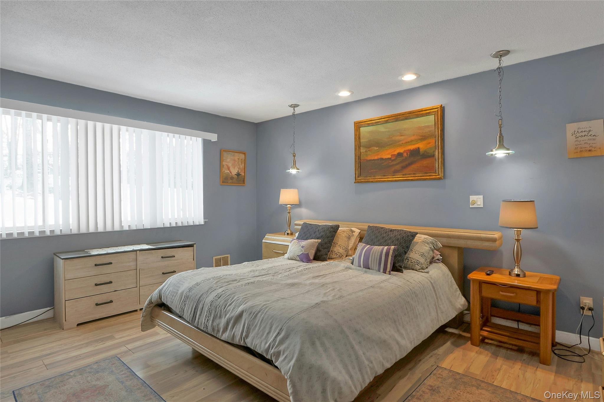 8 Windmill Lane New City, NY 10956 - Photo 17 of 33 a bedroom with a bed and a night stand