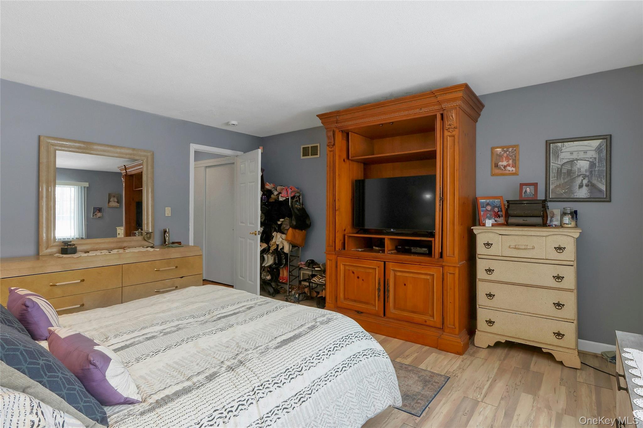 8 Windmill Lane New City, NY 10956 - Photo 18 of 33 a bedroom with a bed and a flat screen tv