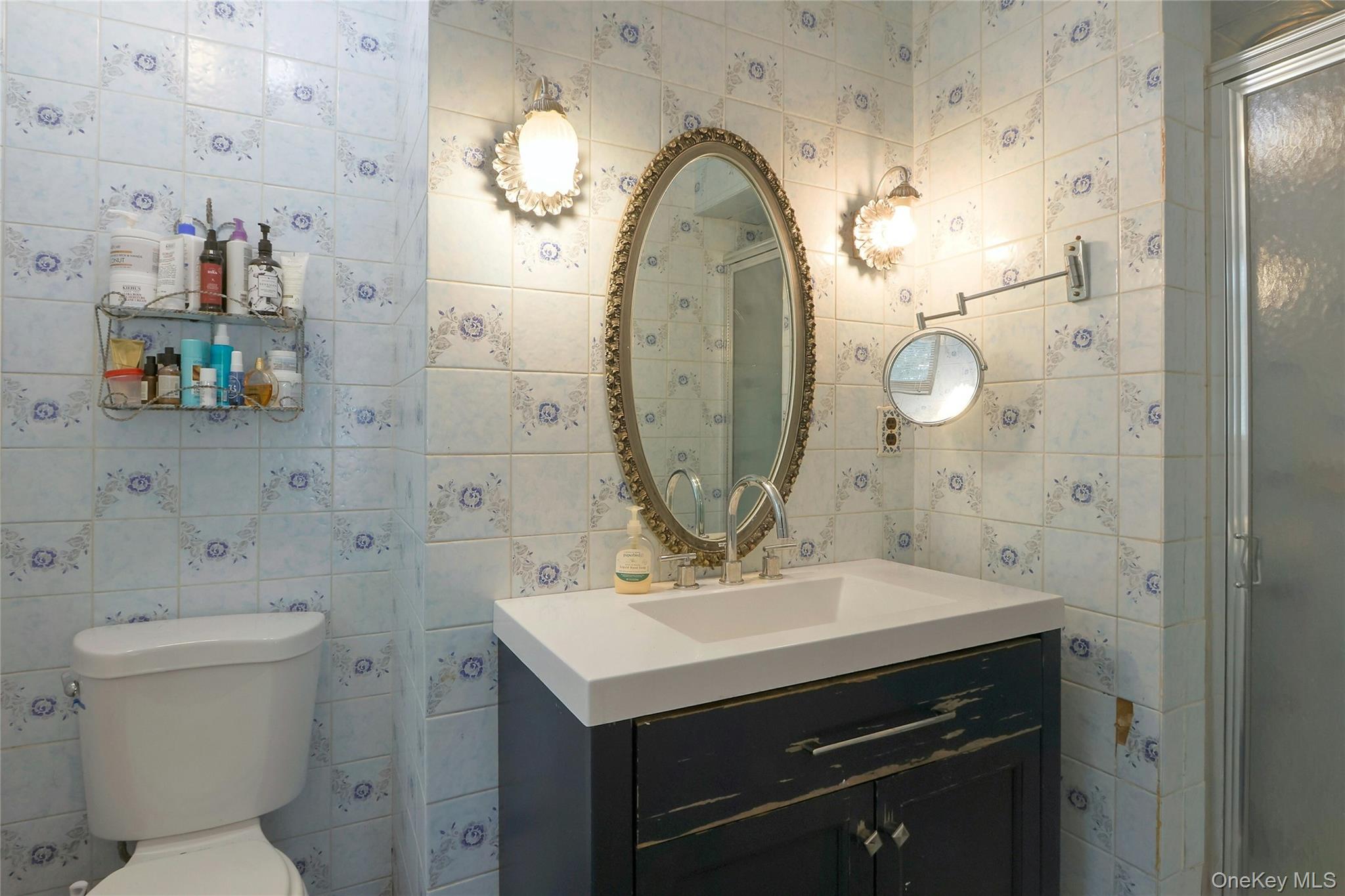 8 Windmill Lane New City, NY 10956 - Photo 19 of 33 a bathroom with a sink mirror and toilet