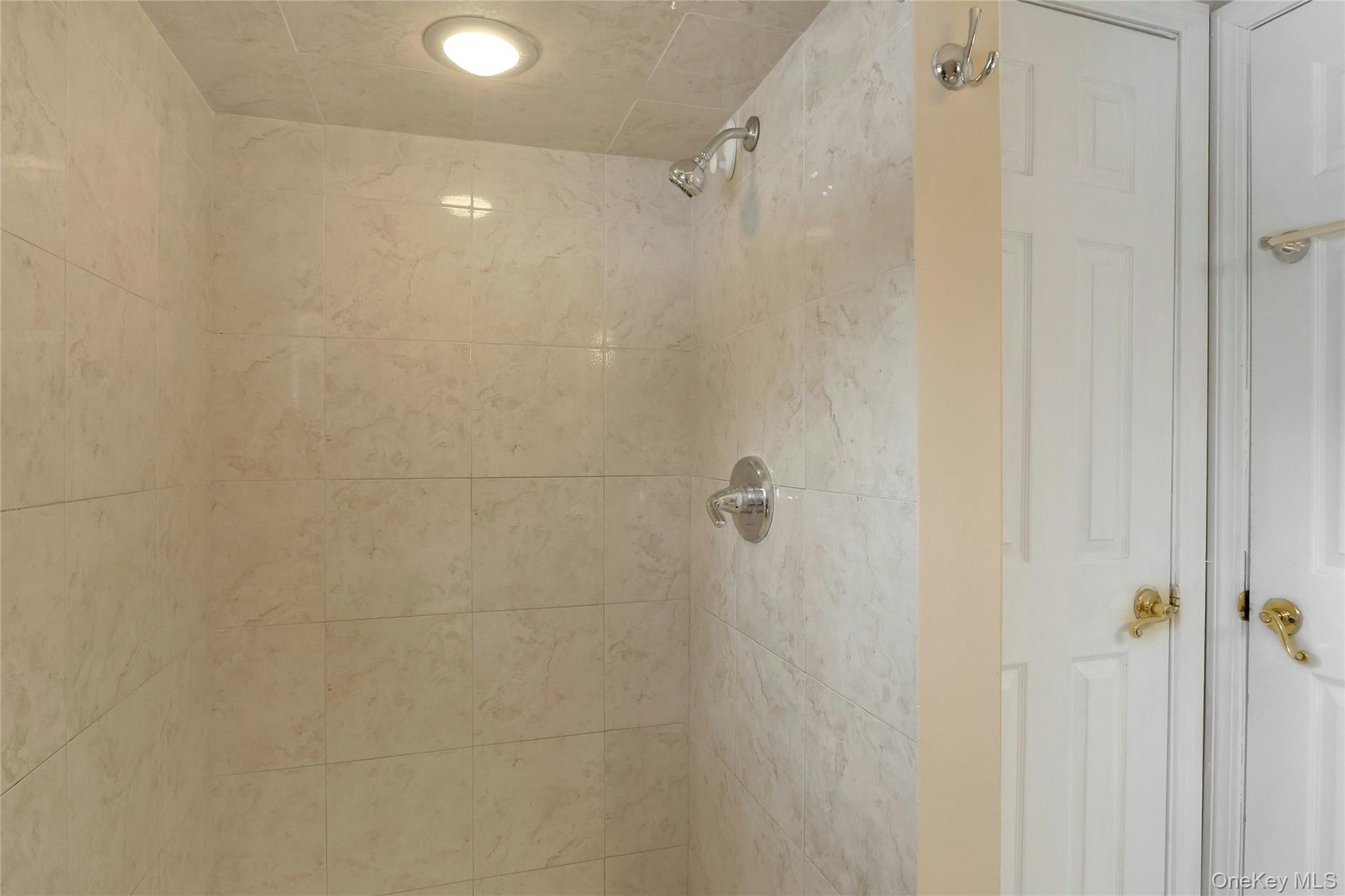 8 Windmill Lane New City, NY 10956 - Photo 24 of 33 a bathroom with a shower