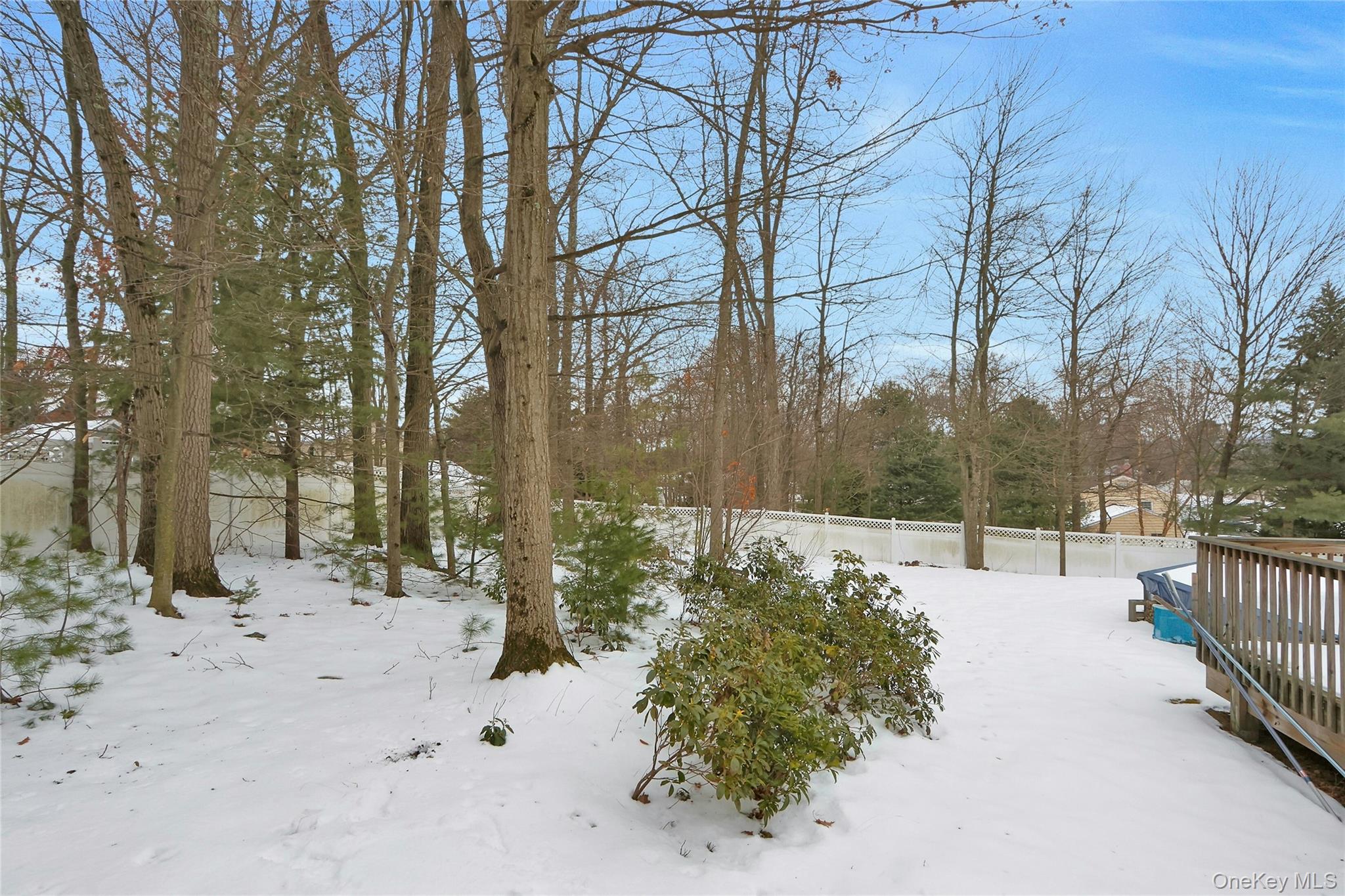 8 Windmill Lane New City, NY 10956 - Photo 30 of 33 a view of a yard covered in snow