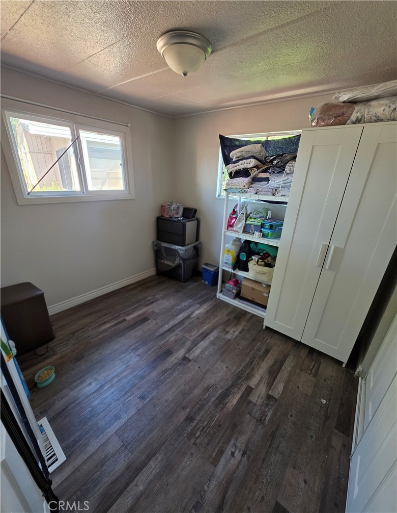 1350 San Bernardino Road, Unit 144 Upland, CA 91786 - Photo 15 of 17 a room with furniture and a window