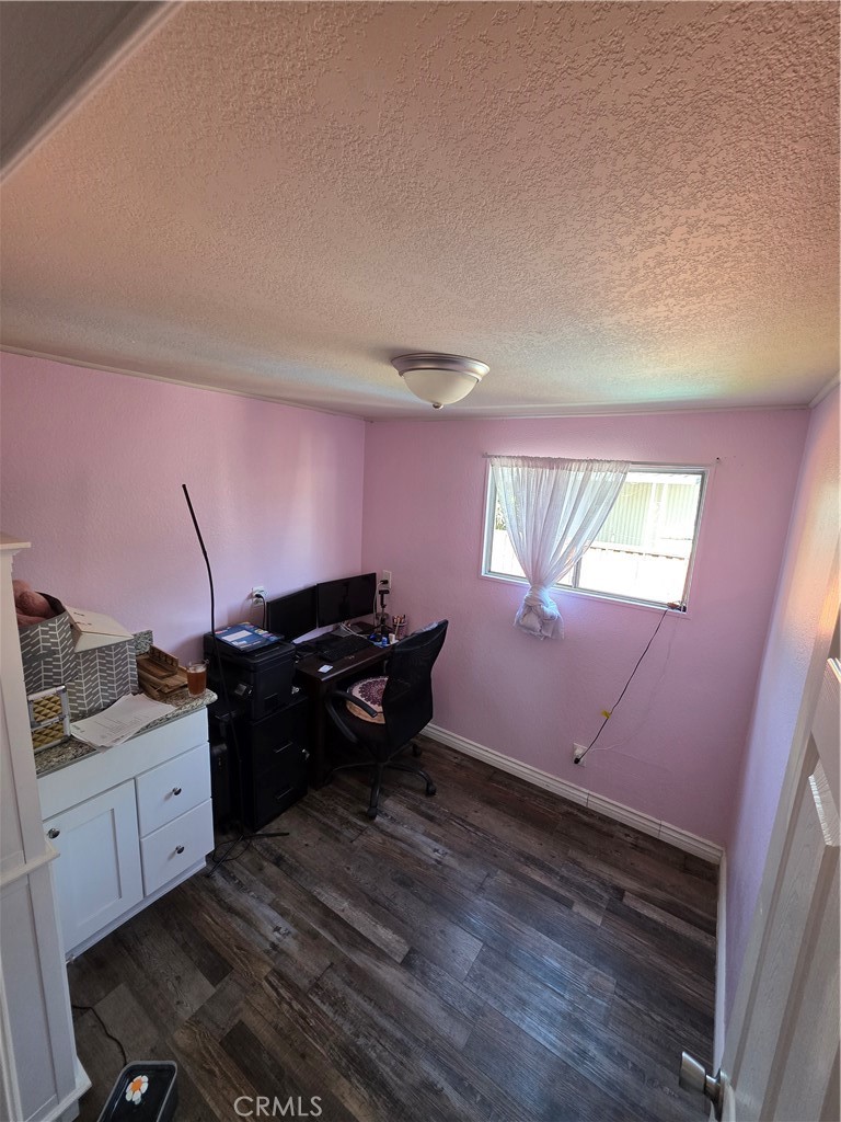 1350 San Bernardino Road, Unit 144 Upland, CA 91786 - Photo 16 of 17 a living room with furniture and a window