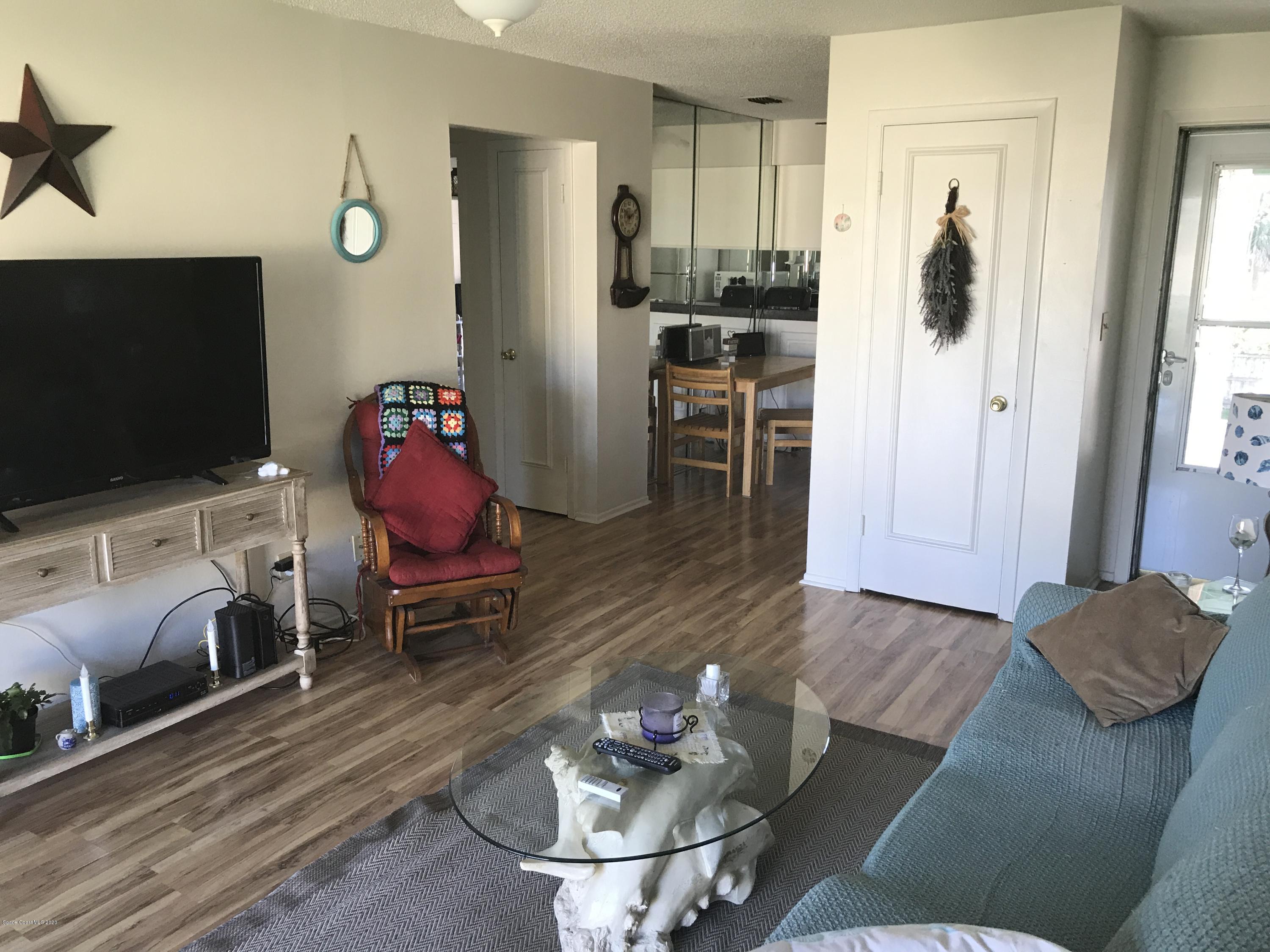 1225 North Wickham Road, Unit 823 Melbourne, FL 32935 - Photo 2 of 28 7C52AF4E-9220-4D1E-8FC1-81CA381DA10B