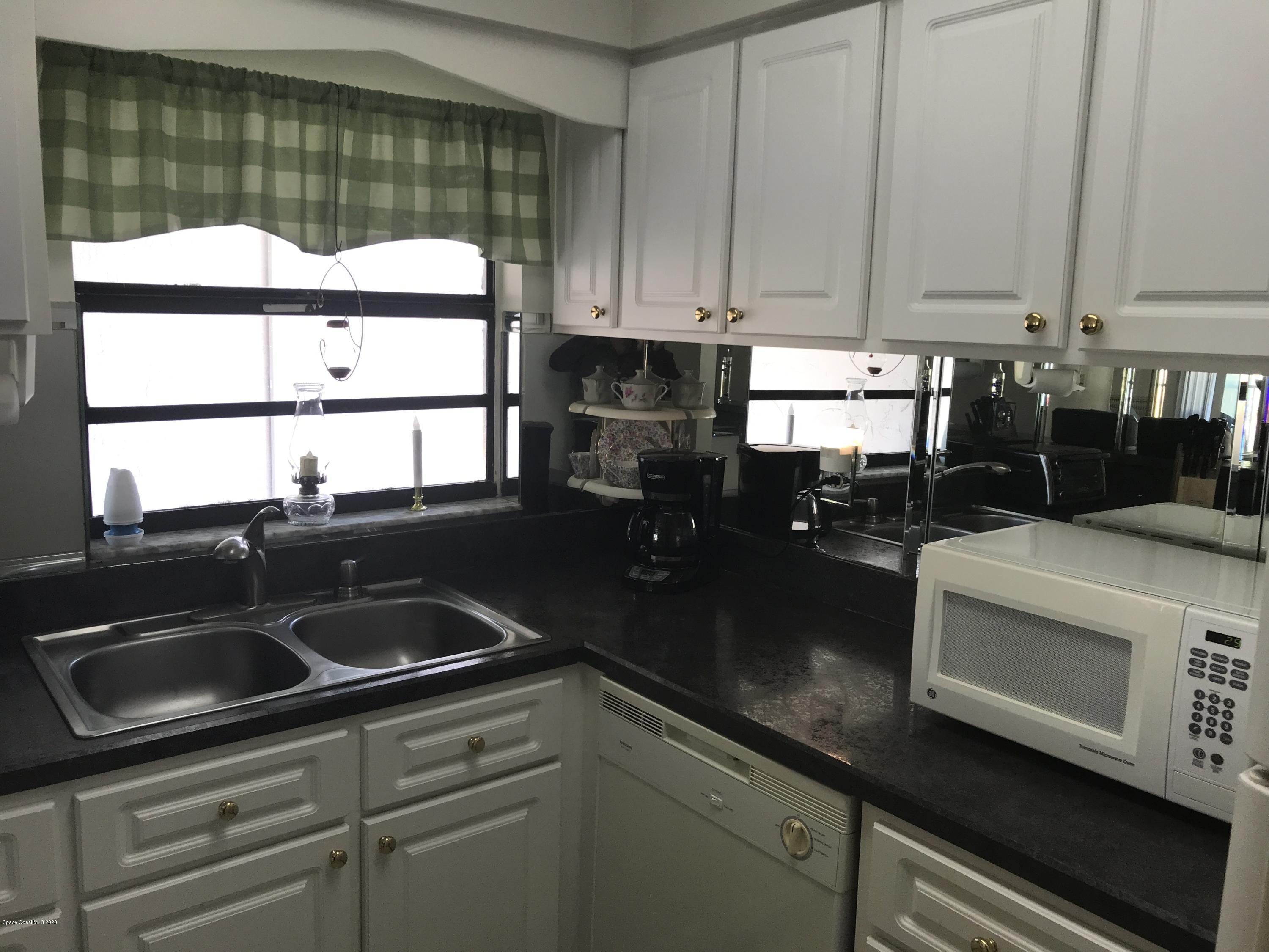 1225 North Wickham Road, Unit 823 Melbourne, FL 32935 - Photo 8 of 28 A0137BBB-3EF2-4B58-BF0D-DFF3ED48374F