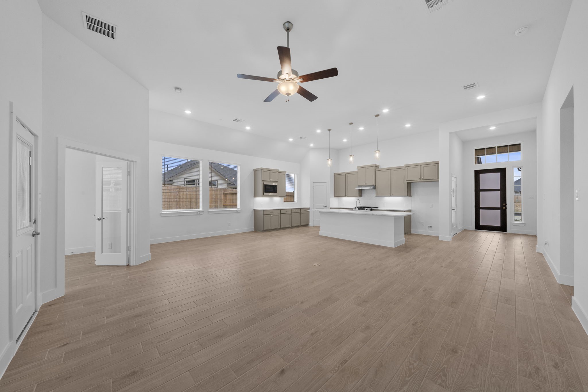 337 Gambels Quail Road Waller, TX 77484 - Photo 10 of 35 a view of a kitchen with a sink and a window