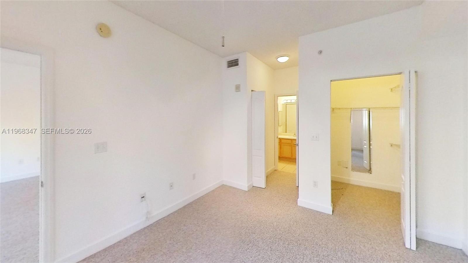 6001 Southwest 70th Street, Unit 217 South Miami, FL 33143 - Photo 13 of 21 a view of an empty room