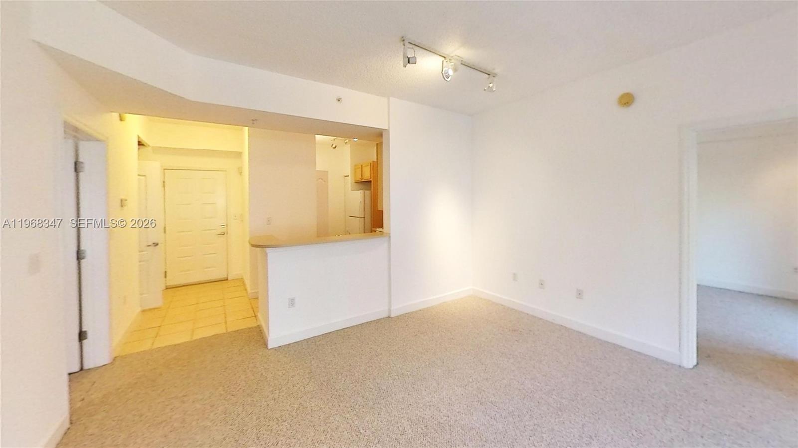 6001 Southwest 70th Street, Unit 217 South Miami, FL 33143 - Photo 16 of 21 a view of an empty room