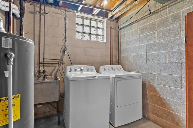 a utility room with dryer and washer