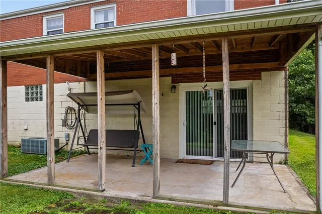 a front view of a house with a porch