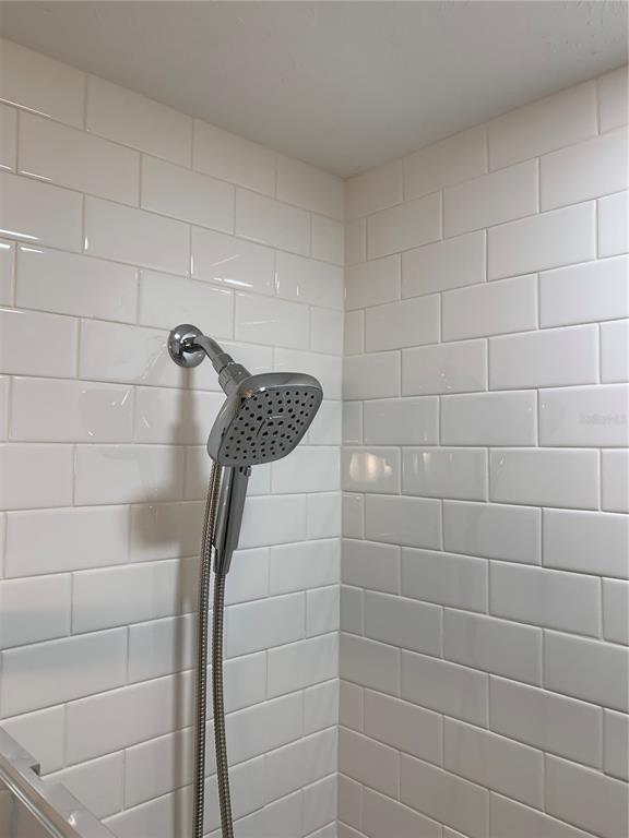 5830 Midnight Pass Road, Unit 94 Sarasota, FL 34242 - Photo 14 of 36 a bathroom with a shower