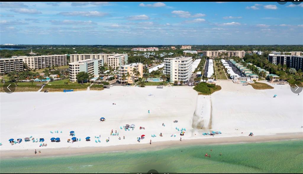 5830 Midnight Pass Road, Unit 94 Sarasota, FL 34242 - Photo 24 of 36 a view of swimming pool from a balcony