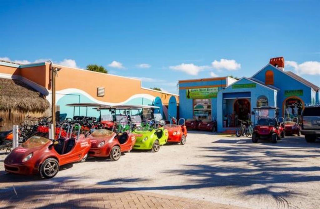 5830 Midnight Pass Road, Unit 94 Sarasota, FL 34242 - Photo 31 of 36 a view of a street with cars
