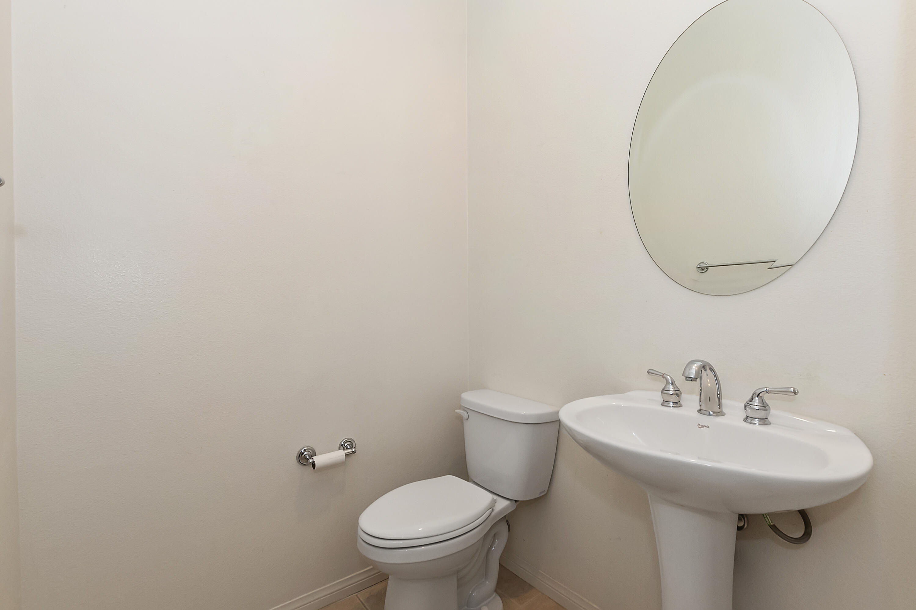 134 Via Tuscany Rancho Mirage, CA 92270 - Photo 16 of 44 a bathroom with a sink and a toilet