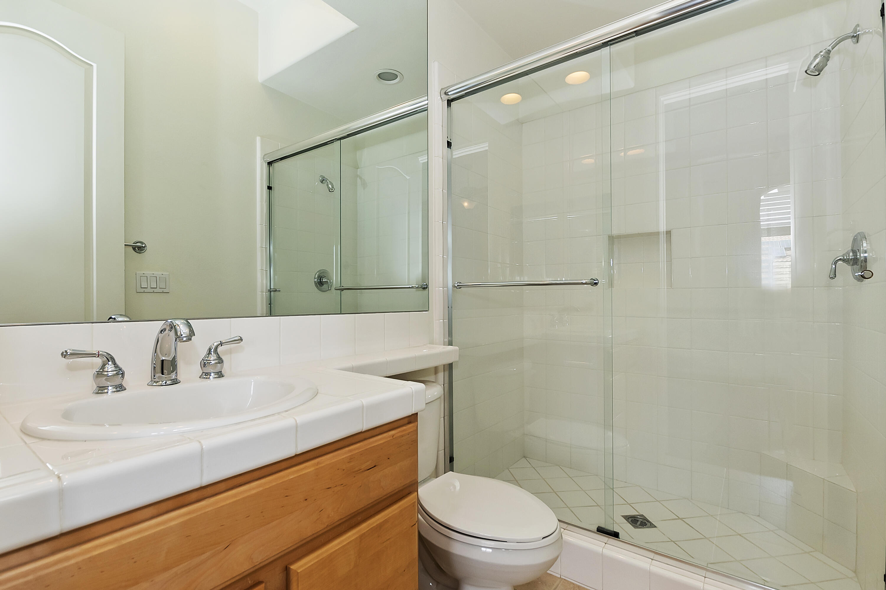 134 Via Tuscany Rancho Mirage, CA 92270 - Photo 20 of 44 a bathroom with a sink a toilet and shower