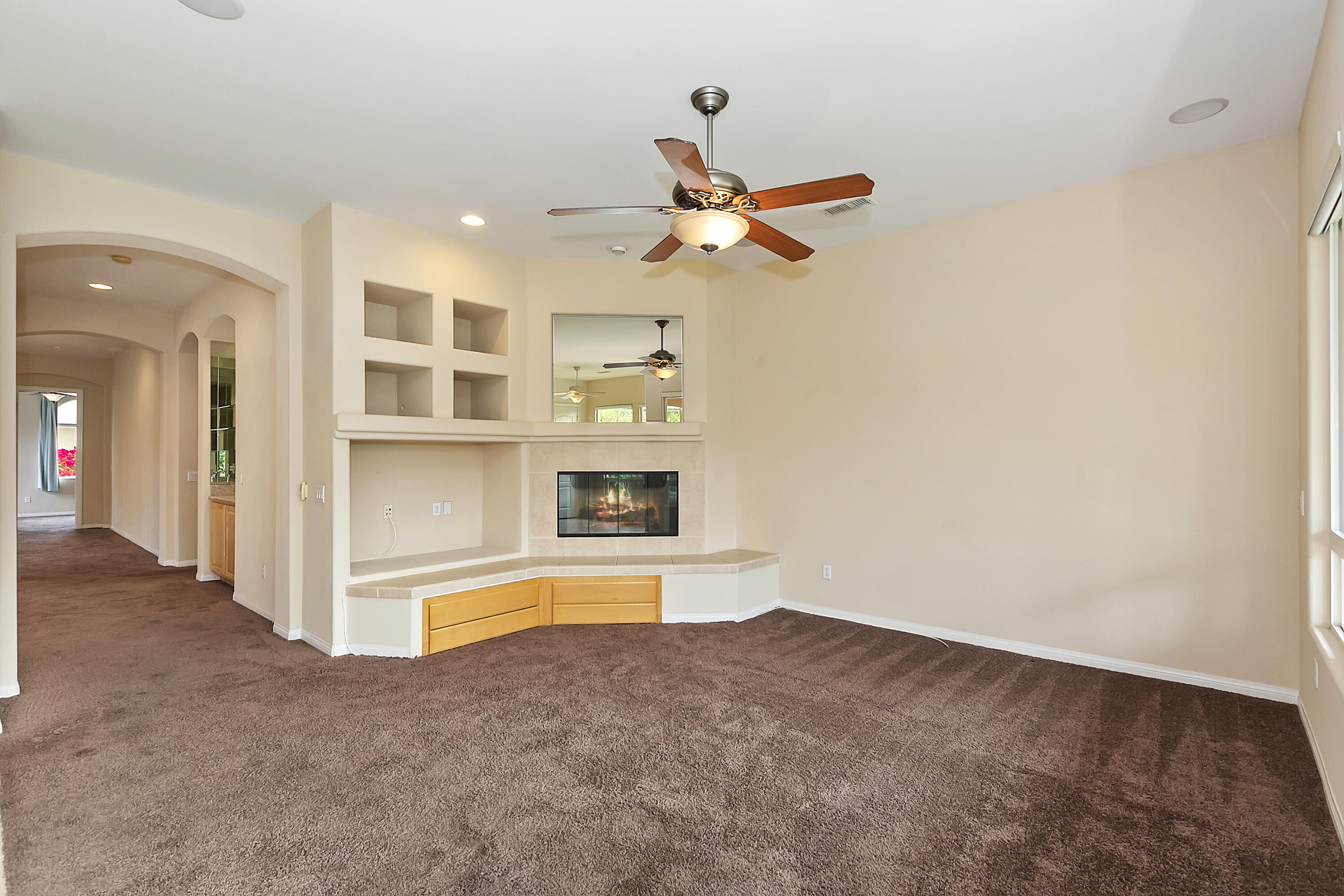 134 Via Tuscany Rancho Mirage, CA 92270 - Photo 9 of 44 an empty room with a empty space and windows