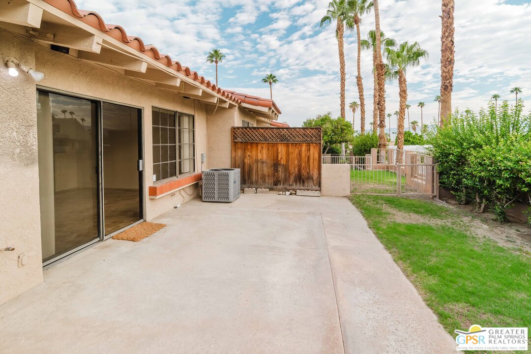 46400 Ryway Place, Unit 10 Palm Desert, CA 92260 - Photo 14 of 48 a view of a house with backyard and porch