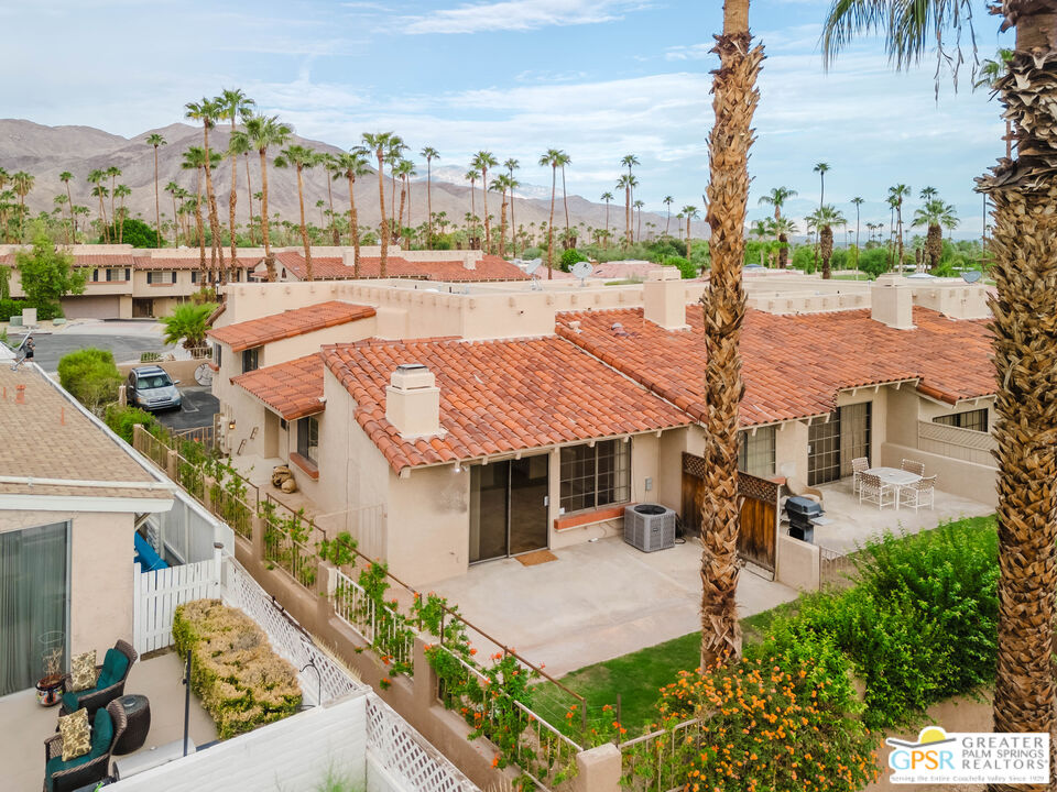46400 Ryway Place, Unit 10 Palm Desert, CA 92260 - Photo 20 of 48 a aerial view of a house with a garden and plants